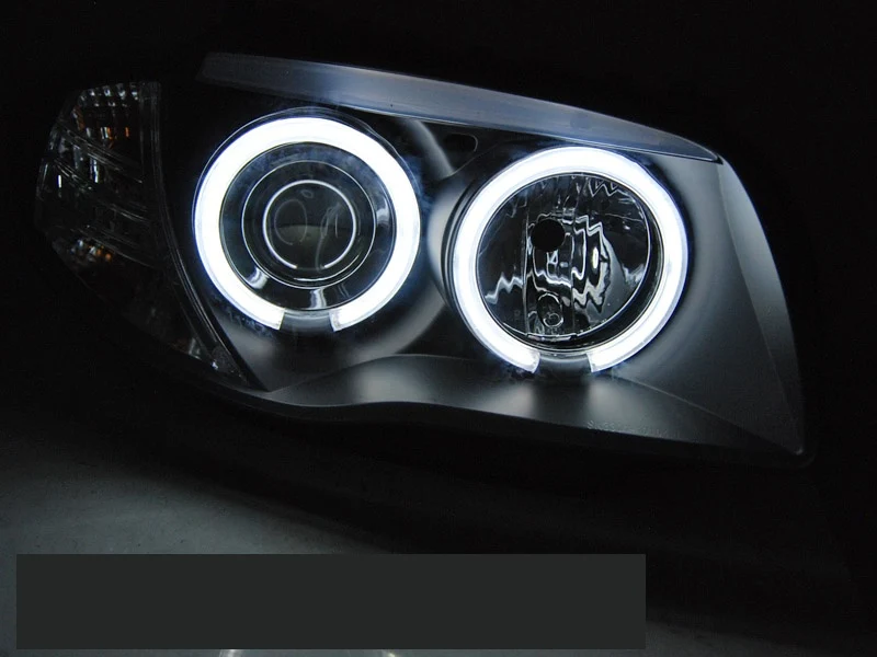Frontlykter BMW 1-serie E81/E87/E82/E88 2004-2011 CCFL Angel Eyes Svart - LPBMM6