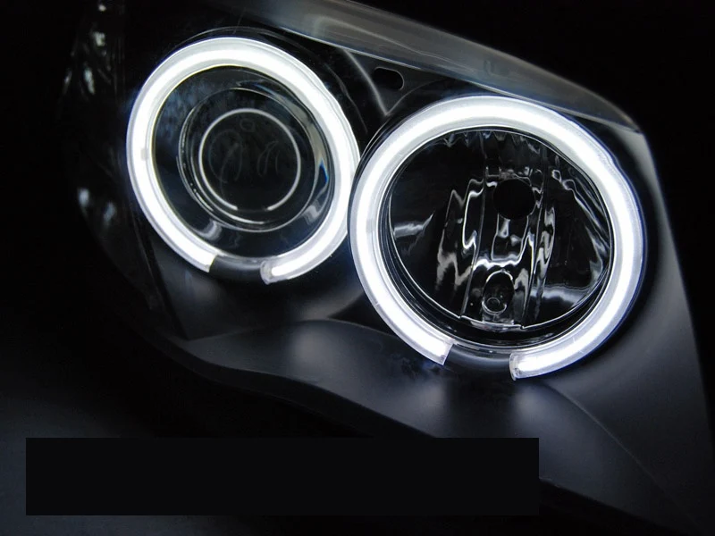 Frontlykter BMW 1-serie E81/E87/E82/E88 2004-2011 CCFL Angel Eyes Svart - LPBMM6